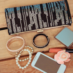 Purse and cell phone of girl going to the prom.