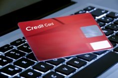 credit card and laptop for internet purchase
