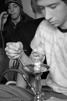 young man smoking salvia