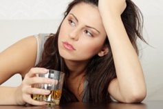 young woman addicted to alcohol