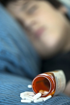 Overdosed teenager with pills
