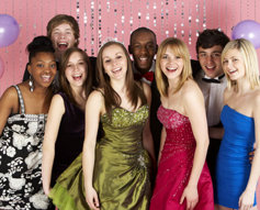 group of young people dressed for prom