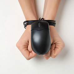 Computer mouse wrapped around the hands.