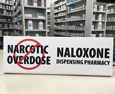Pharmacy sign—No narcotic overdose, naloxone dispensing pharmacy.