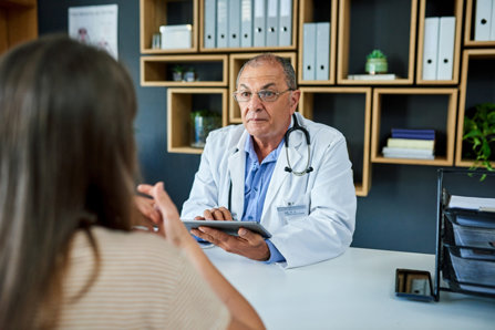 Doctor talks with patient