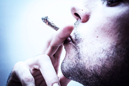 Tinted image of a marijuana smoker.