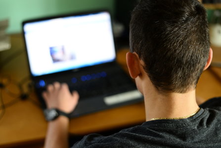 Teenager browsing in internet
