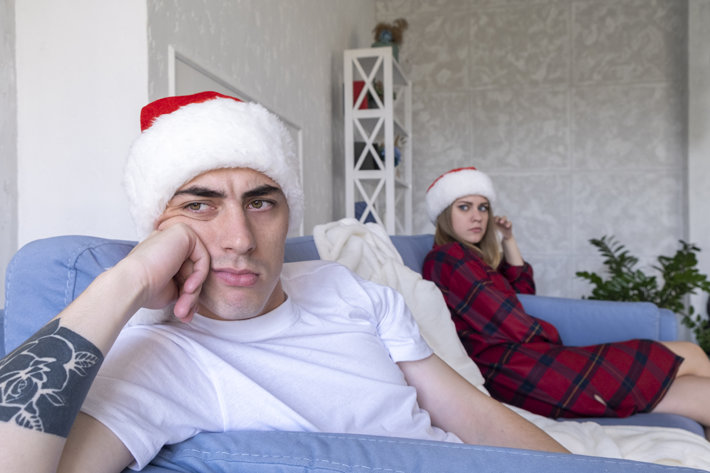 Young couple is having quarrel in Christmas