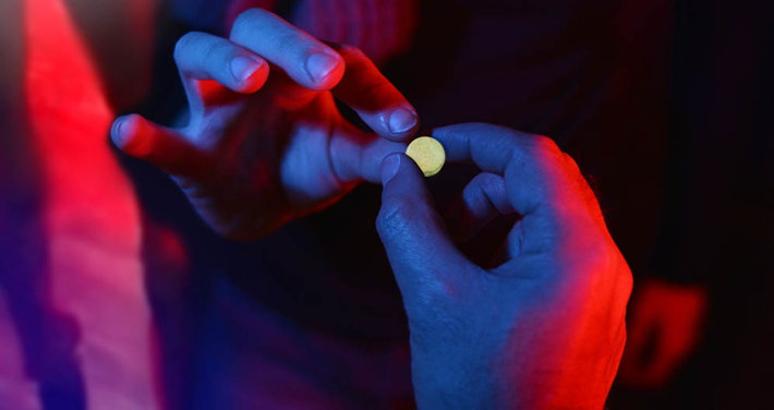 club drug pills being shared at nightclub
