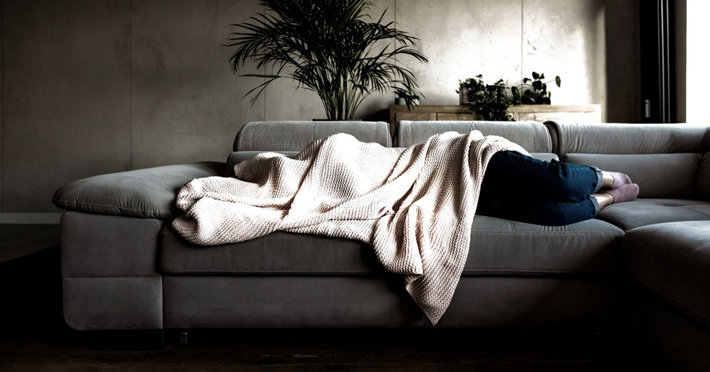 Home addicts are covered by a blanket during the pandemic 