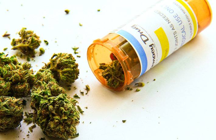 Medical marijuana and bottle. 